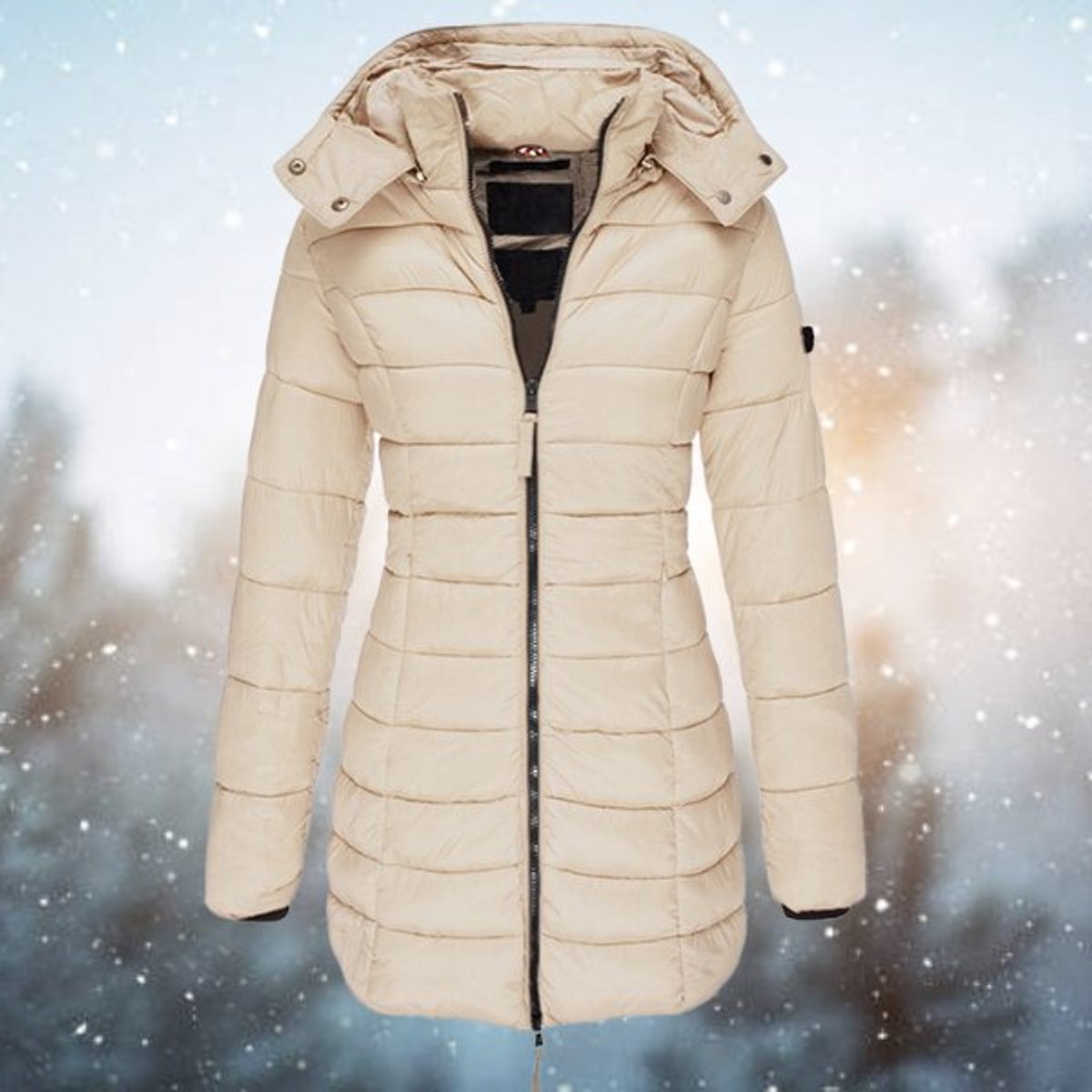 Emily women's long hooded quilted puffer coat by Christine Brewer featuring a padded design and a cozy, longline fit.