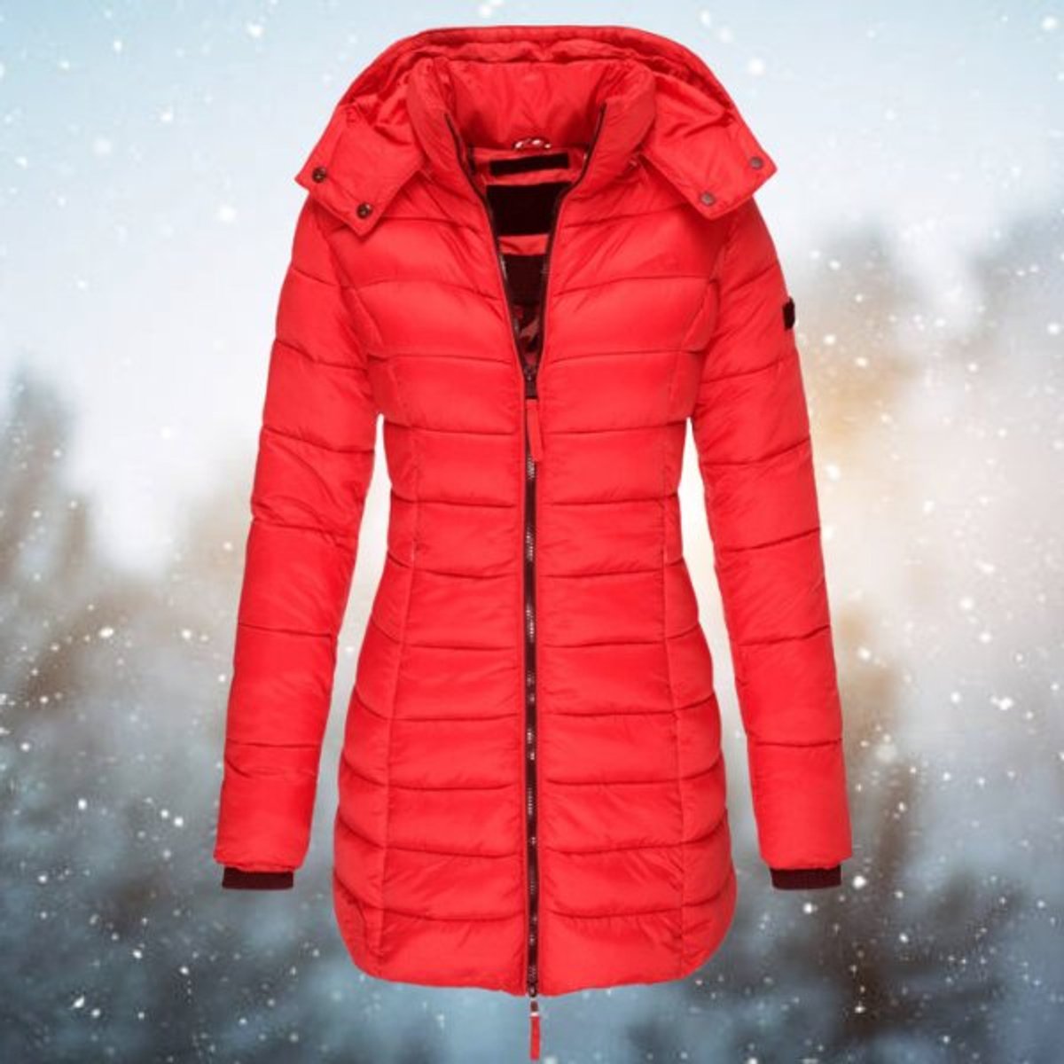 Emily women's long hooded quilted puffer coat by Christine Brewer, featuring a padded design and a cozy hood for winter warmth.
