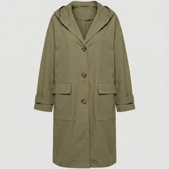 Woman wearing Christine Brewer Rosie long waterproof windproof hooded trench coat, stylish and functional outerwear for rainy days.