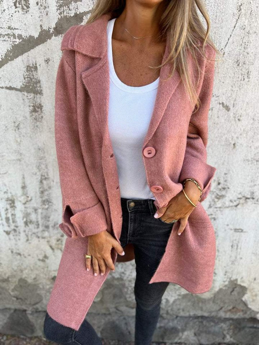 Women's Isla oversized longline coat with lapel collar and button-up front, featuring a relaxed fit by Christine Brewer.