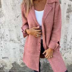 Women's longline button-up coat with lapel collar and oversized fit by Christine Brewer, shown with front view and tailored details.
