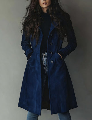 Women's longline double-breasted tailored trench coat by Christine Brewer, shown on a model, featuring classic style and structured fit.