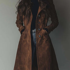 Women's longline double-breasted tailored trench coat by Christine Brewer, featuring classic design and sophisticated style.