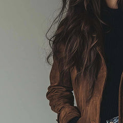 Christine Brewer women's longline double-breasted tailored trench coat hanging on a hanger, showcasing classic style and beige color.
