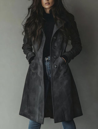 Women’s longline double-breasted tailored trench coat by Christine Brewer, shown in a stylish, fitted design with classic lapels.
