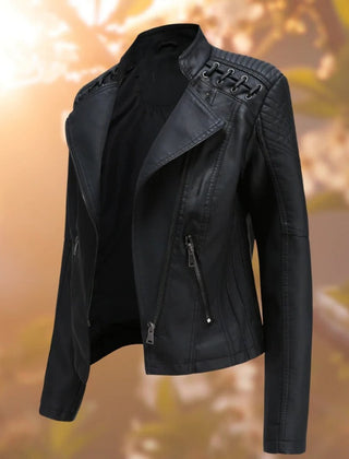 Women's faux leather biker jacket by Christine Brewer featuring a zip-up moto-style design, classic biker collar, and fitted silhouette.