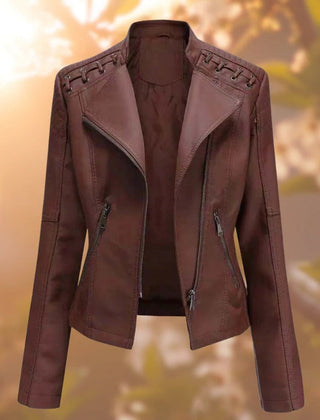 Women's faux leather biker jacket by Christine Brewer featuring a zip-up moto style, perfect for a stylish, edgy look.