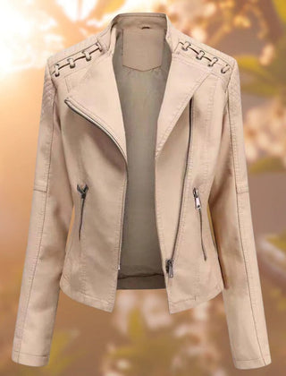 Women's faux leather biker jacket by Christine Brewer featuring a zip-up moto style design on a model.