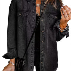 Olivia women's oversized black denim jacket with longline fit and frayed hem, stylish and casual outerwear by Christine Brewer.