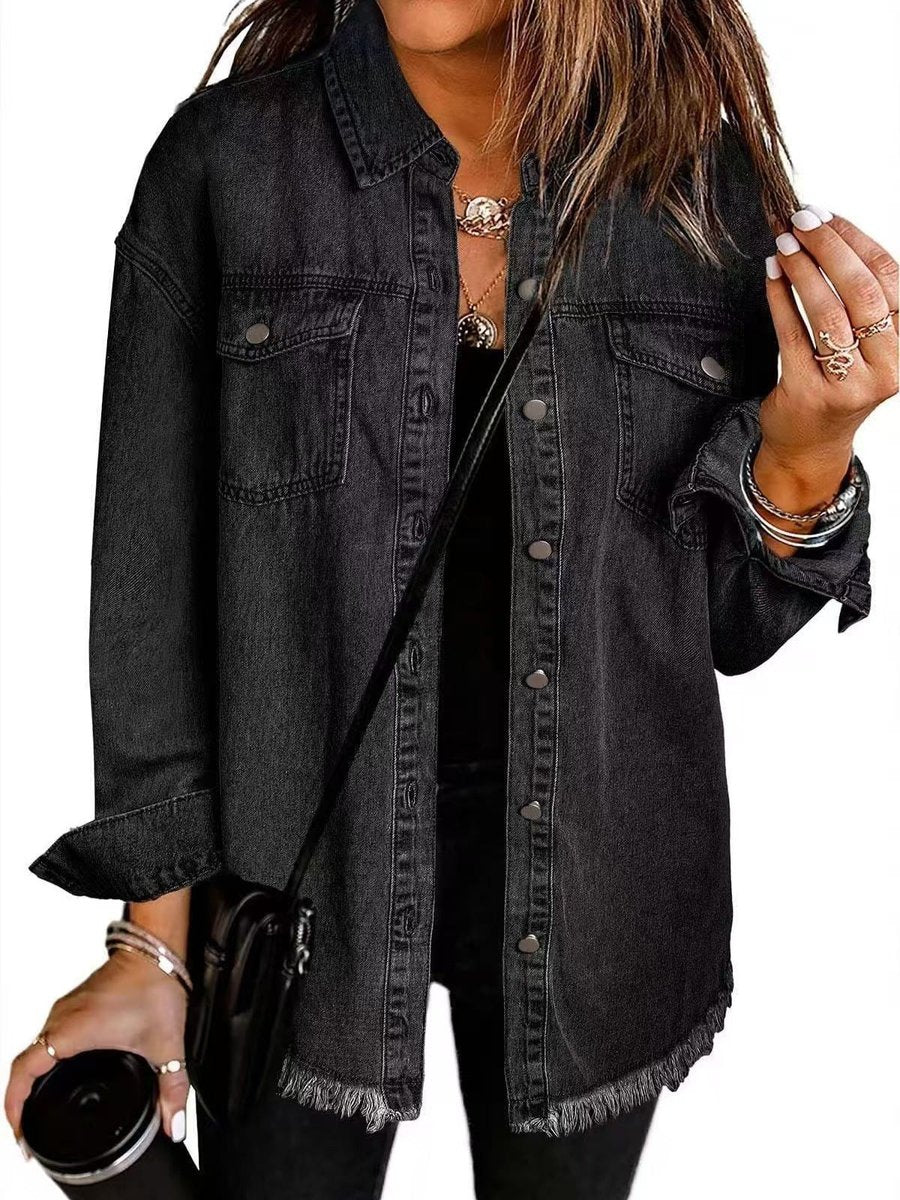 Olivia women's oversized black denim jacket with longline fit and frayed hem, stylish and casual outerwear by Christine Brewer.