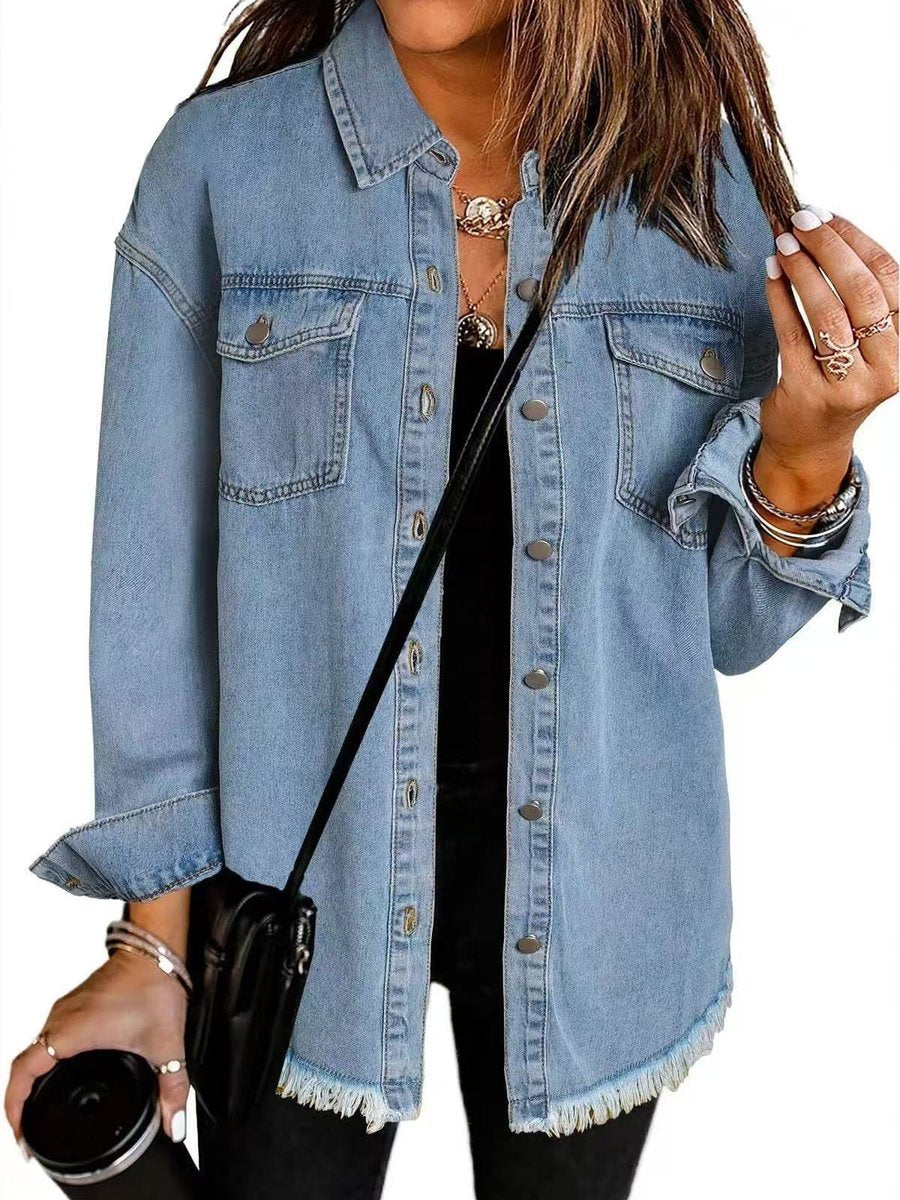 Olivia women's oversized black denim jacket with longline fit and frayed hem, featuring a casual, trendy style by Christine Brewer