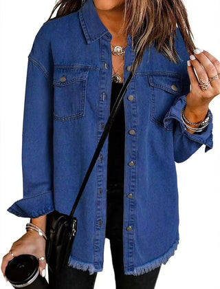 Women's oversized black denim jacket with longline fit and frayed hem, by Christine Brewer, shown on a model.