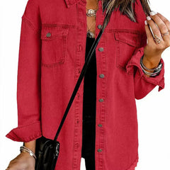 Olivia women's oversized black denim jacket with longline fit and frayed hem, styled for a casual look.