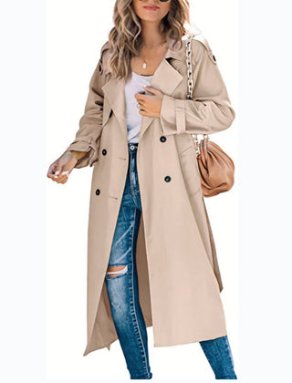 Olivia women's oversized double-breasted belted longline trench coat by Christine Brewer, shown on a model with classic beige color.