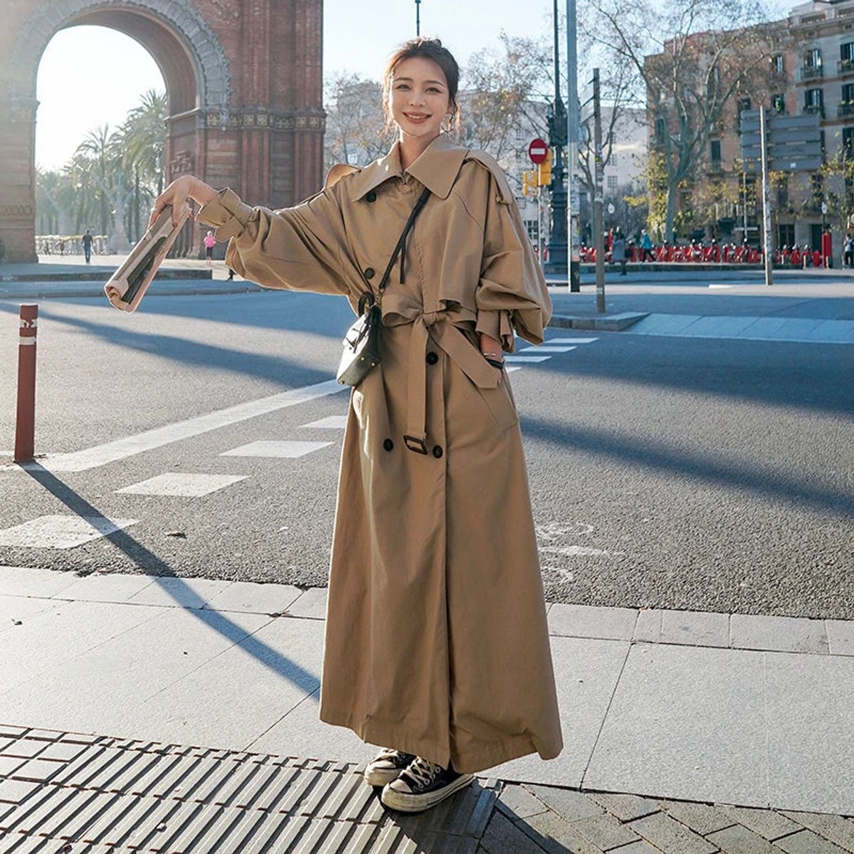Women's oversized double-breasted long trench coat by Christine Brewer, stylish maxi coat with classic design and double-breasted details.