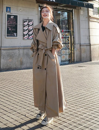 Emily women's oversized double-breasted longline trench coat by Christine Brewer, shown in a stylish longline design with a classic collar.