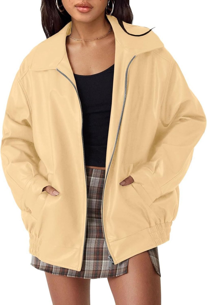 Women’s oversized faux leather bomber jacket by Christine Brewer with zip-up front, stylish and trendy for casual wear.