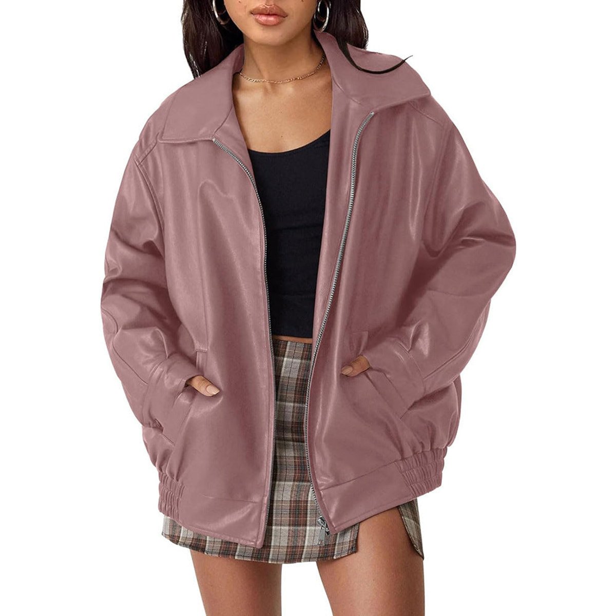 Women's oversized faux leather bomber jacket by Christine Brewer with zip-up front, styled for a casual, edgy look.