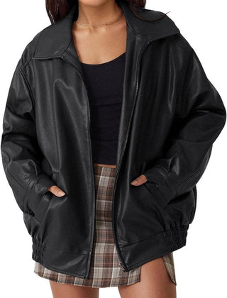 Women’s oversized faux leather bomber jacket by Christine Brewer with a front zip-up closure, stylish and modern outerwear.
