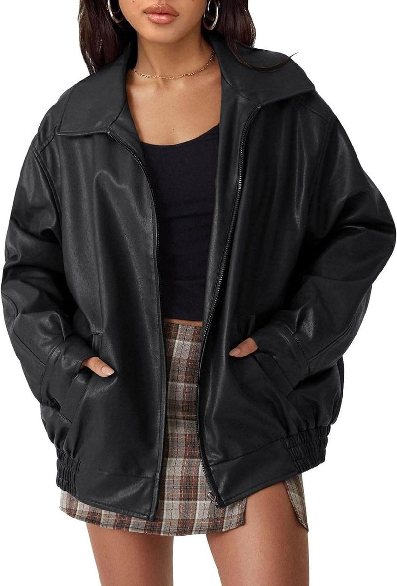 Women’s oversized faux leather bomber jacket by Christine Brewer with a front zip-up closure, stylish and modern outerwear.
