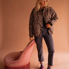 Women's oversized leopard print quilted jacket with snap buttons by Christine Brewer, featuring a stylish animal print design.