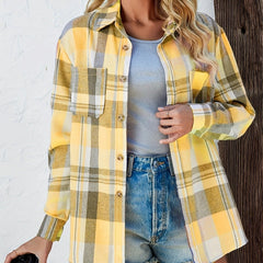 Christine Brewer women's oversized plaid flannel long sleeve button-up shirt, featuring a classic red and black checkered design.