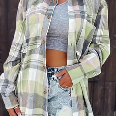 Women's oversized plaid flannel long sleeve button-up shirt by Christine Brewer, featuring a classic checkered pattern and relaxed fit.