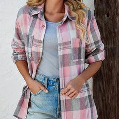 Women's oversized plaid flannel long sleeve button-up shirt by Christine Brewer, featuring a classic checkered pattern and relaxed fit.