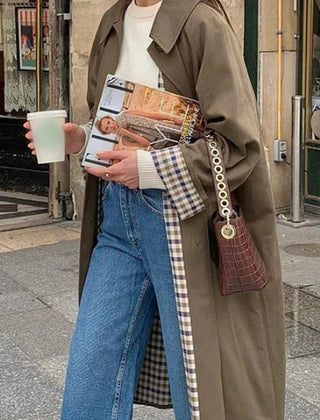 Women's oversized long trench coat with plaid lining by Christine Brewer, featuring a classic design and stylish fit.