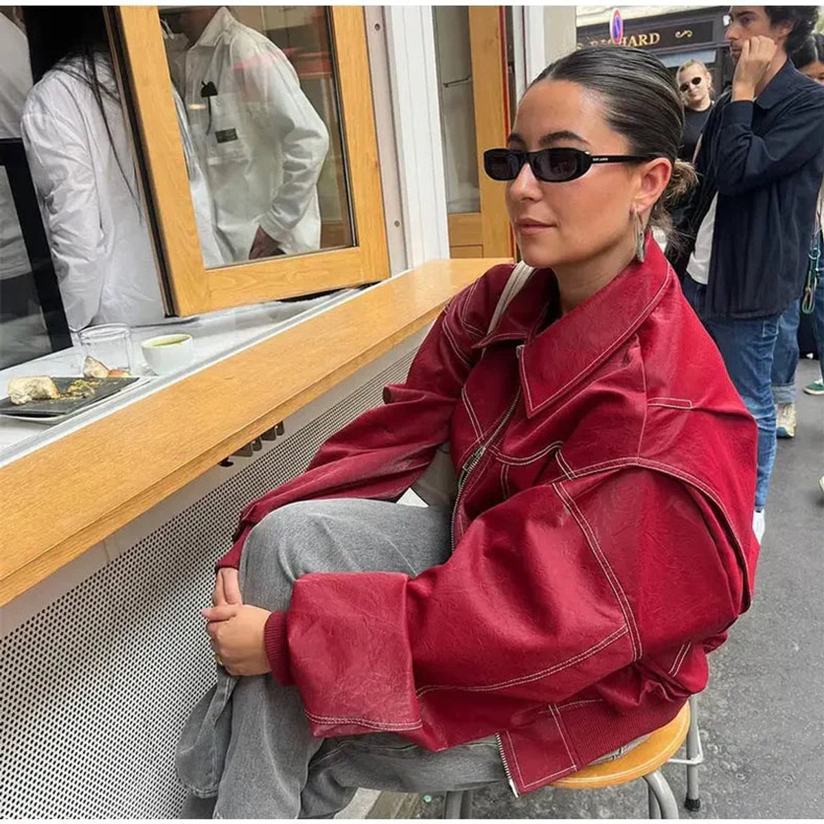 Women’s oversized quilted jacket with contrast stitching and bomber style by Christine Brewer, shown in a relaxed fit with quilted texture.