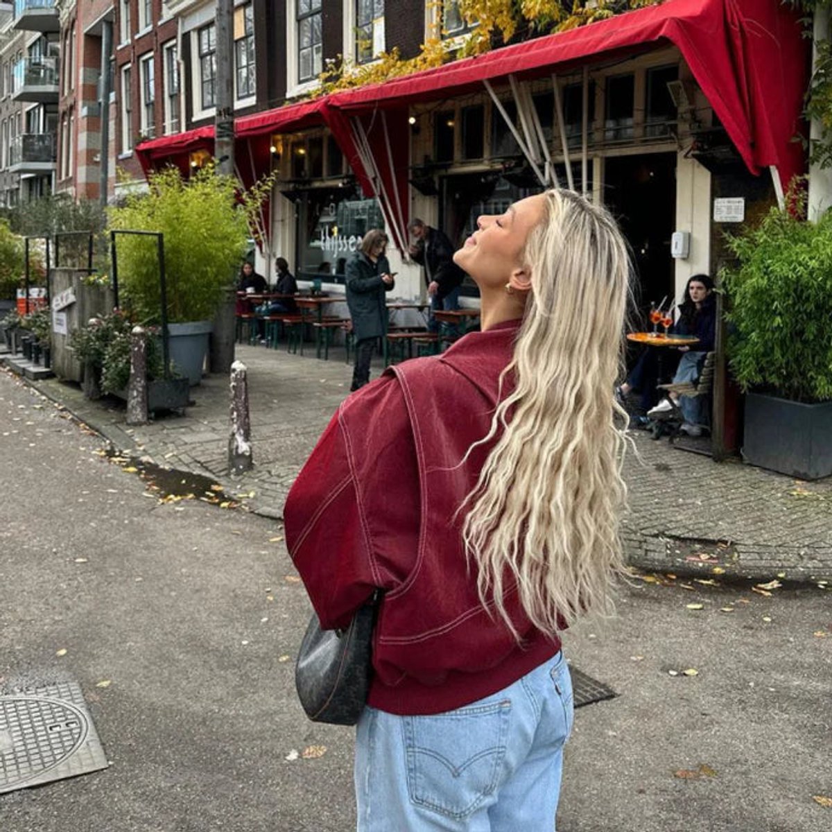 Emily women's oversized quilted bomber jacket with contrast stitching, featuring a relaxed fit and stylish design by Christine Brewer.