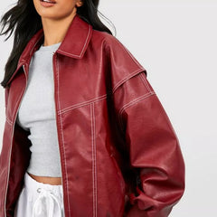 Women's oversized quilted bomber jacket with contrast stitching by Christine Brewer, featuring a relaxed fit and stylish design.