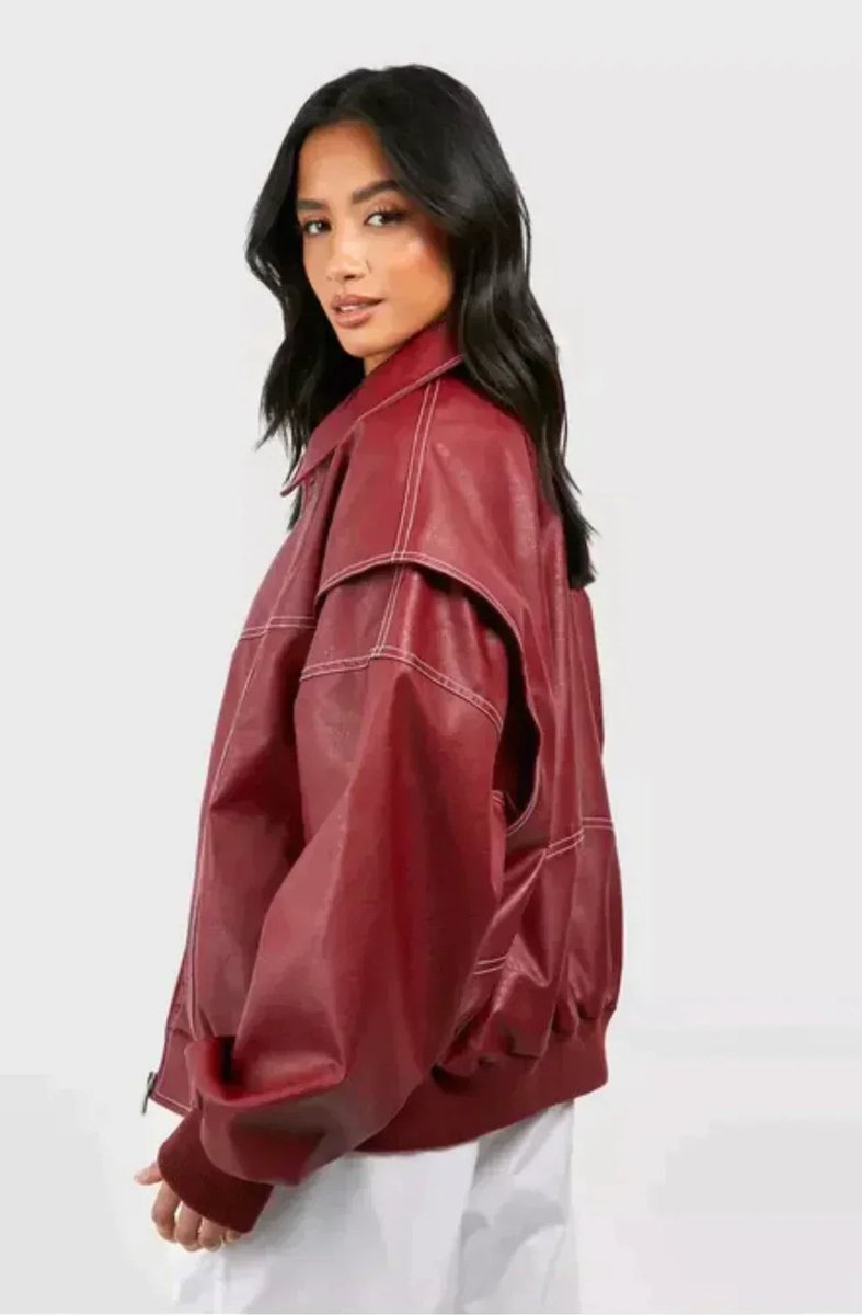 Women’s oversized quilted bomber jacket with contrast stitching by Christine Brewer, featuring a relaxed fit and stylish design.