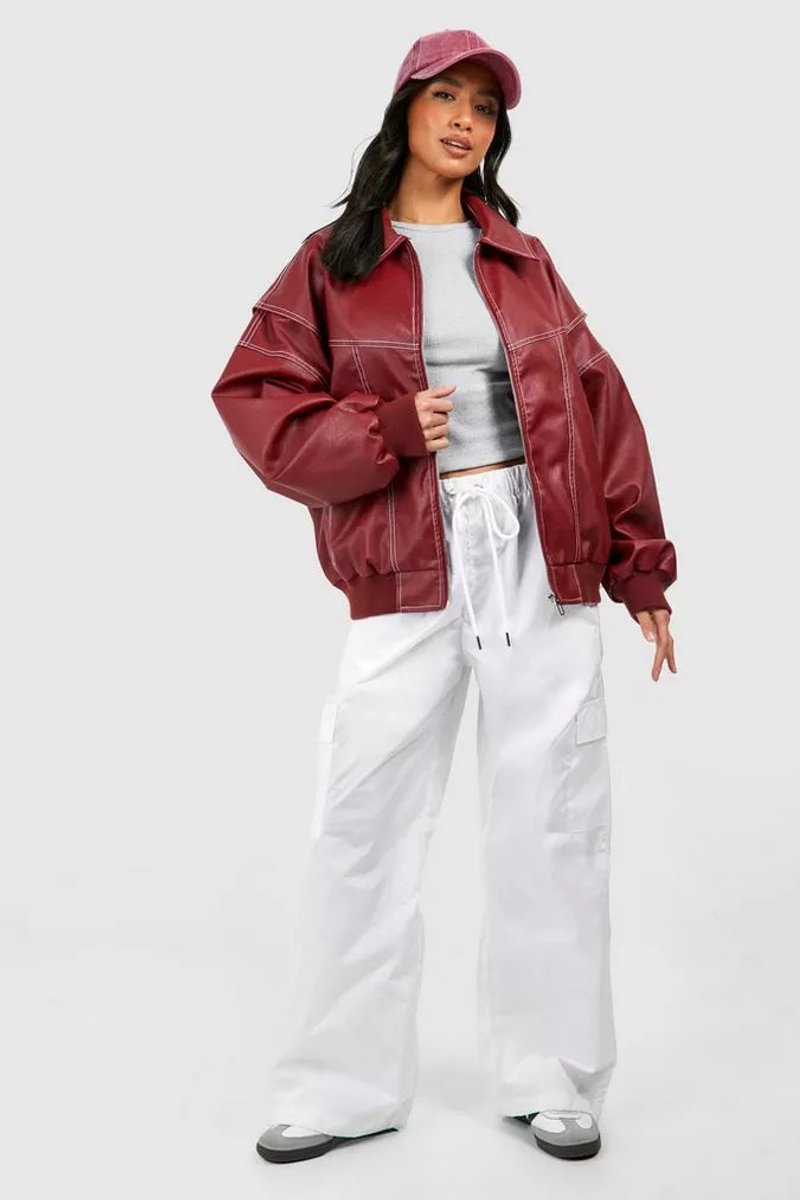 Women’s oversized quilted bomber jacket with contrast stitching by Christine Brewer, featuring a stylish relaxed fit and quilted design.