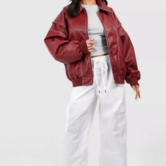 Women's oversized quilted bomber jacket with contrast stitching, featuring a stylish relaxed fit and classic bomber silhouette.