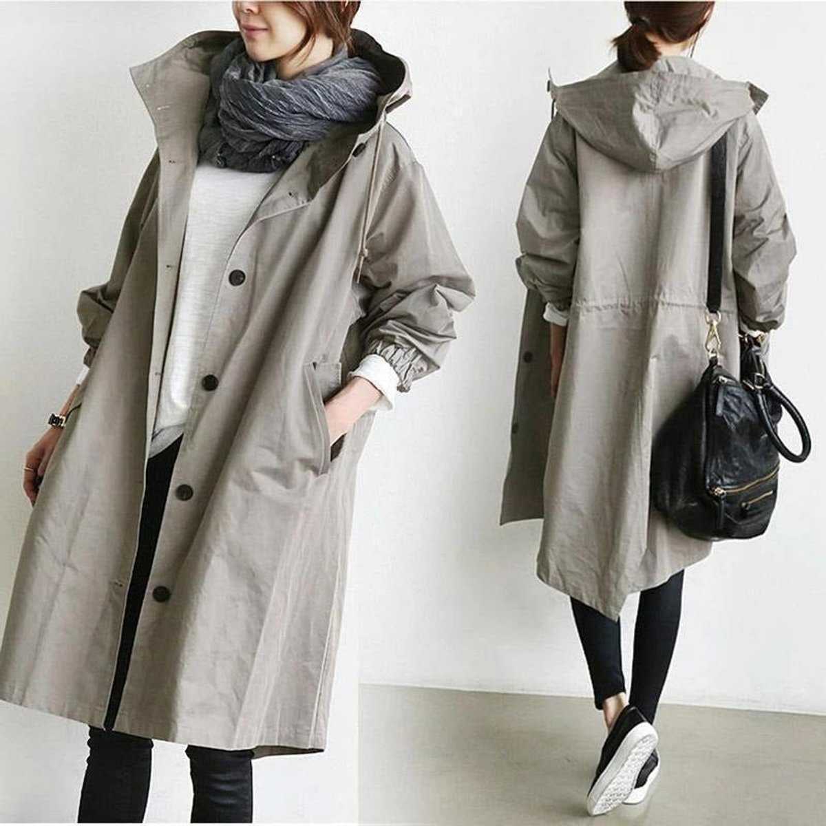 Women's oversized water-resistant trench coat with button front in beige, designed by Christine Brewer, shown on a model.