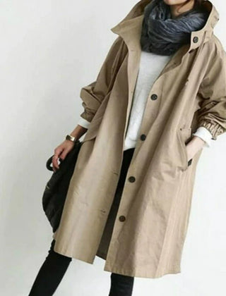 Women's oversized water-resistant trench coat with button front from Christine Brewer, featuring a stylish, loose fit and durable material.