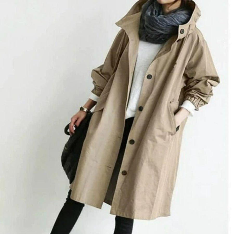 Women's oversized water-resistant trench coat with button front from Christine Brewer, featuring a stylish, loose fit and durable material.