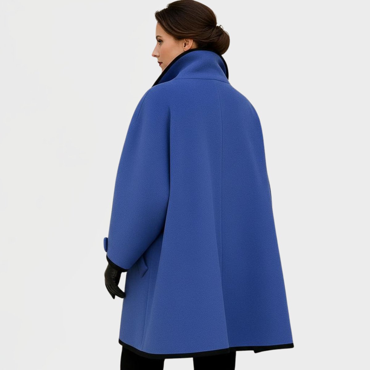 Eleanor women's oversized wool-blend swing coat with contrast trim, stylish and cozy outerwear by Christine Brewer.