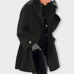 Women's oversized wool-blend swing coat in black with contrast trim by Christine Brewer, featuring a relaxed fit and stylish design.