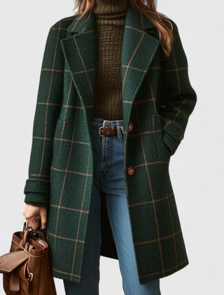 Women's plaid wool-blend longline coat with notch lapel, stylishly displayed on a hanger, showcasing its classic pattern and tailored fit.
