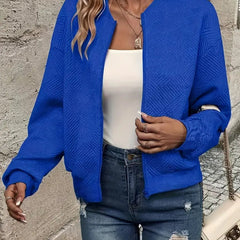 Women's quilted zip-up bomber jacket with textured cropped design by Christine Brewer, featuring a stylish quilted exterior.