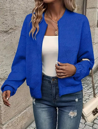 Women's quilted zip-up bomber jacket with textured cropped design by Christine Brewer, featuring a stylish quilted exterior.