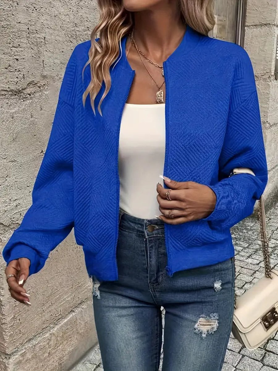 Women's quilted zip-up bomber jacket with textured cropped design by Christine Brewer, featuring a stylish quilted exterior.