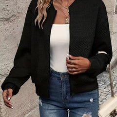 Women's quilted zip-up bomber jacket by Christine Brewer, textured cropped design with quilted stitching and stylish fit.