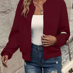 Women's textured quilted zip-up bomber jacket by Christine Brewer, cropped fit with stylish quilted design.