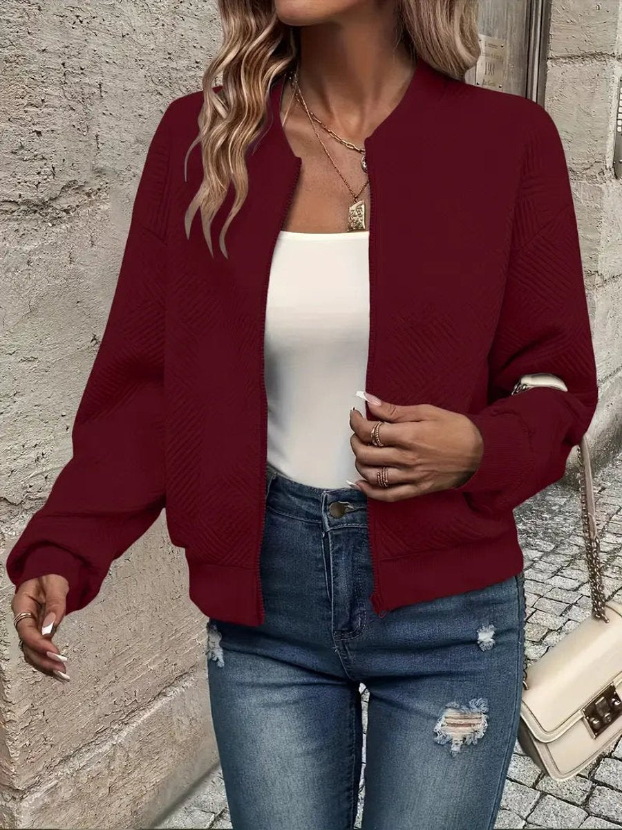 Women's textured quilted zip-up bomber jacket by Christine Brewer, cropped fit with stylish quilted design.