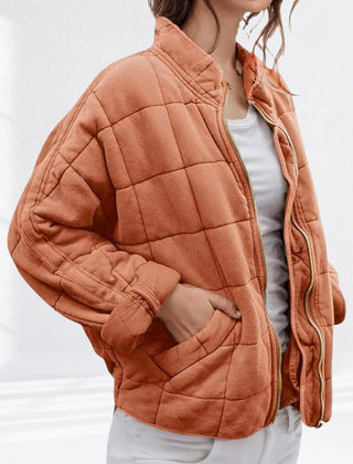 Women's relaxed-fit diamond quilted zip-up jacket by Christine Brewer, casual wear with a stylish quilted pattern.