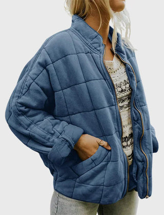 Women's relaxed-fit diamond quilted zip-up jacket by Christine Brewer, featuring casual style and comfortable fit.