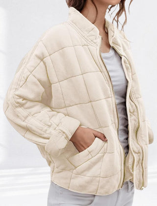 Women's relaxed-fit diamond quilted zip-up jacket by Christine Brewer, casual style with a cozy, textured design.
